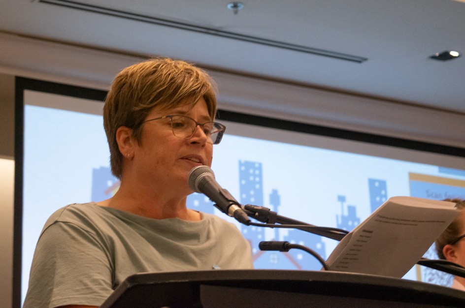 Trish McCourt giving Opening Remarks at a housing conference. 
